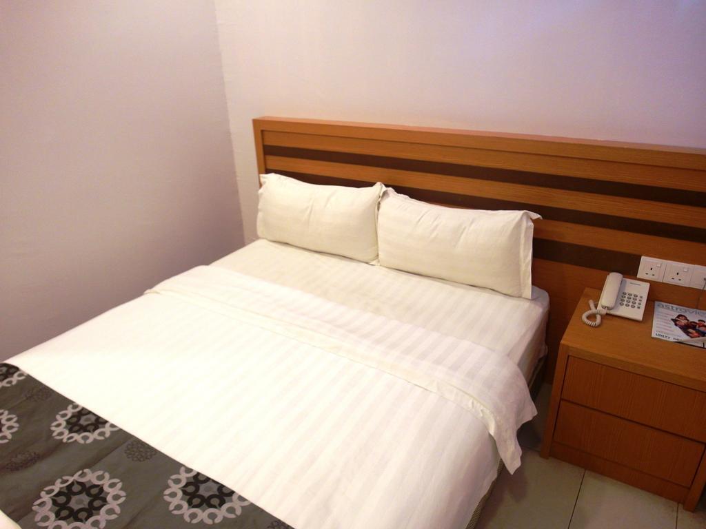 Transit Hotel Лабуан Номер фото